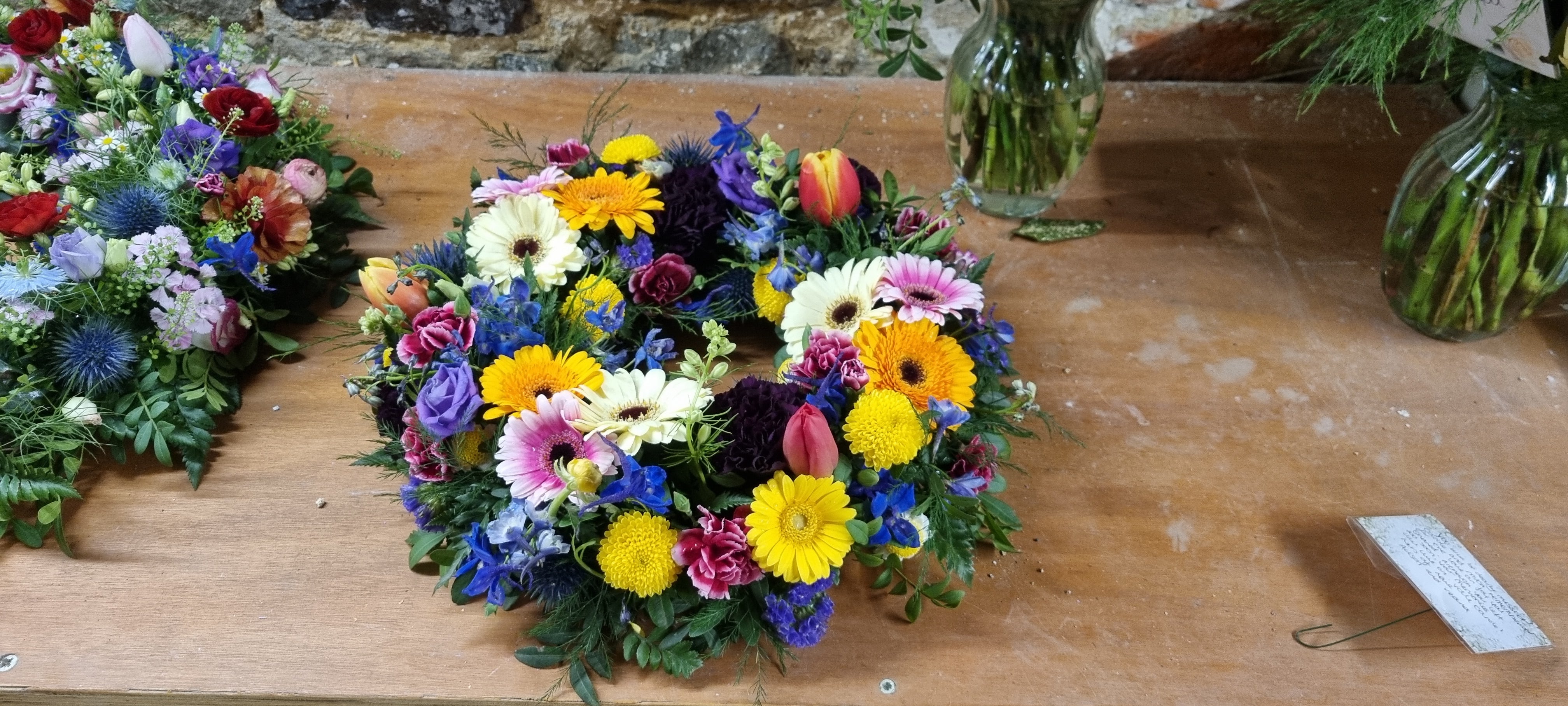 Multicoloured mixed flowers wreath - A Vibrant Celebration of Life