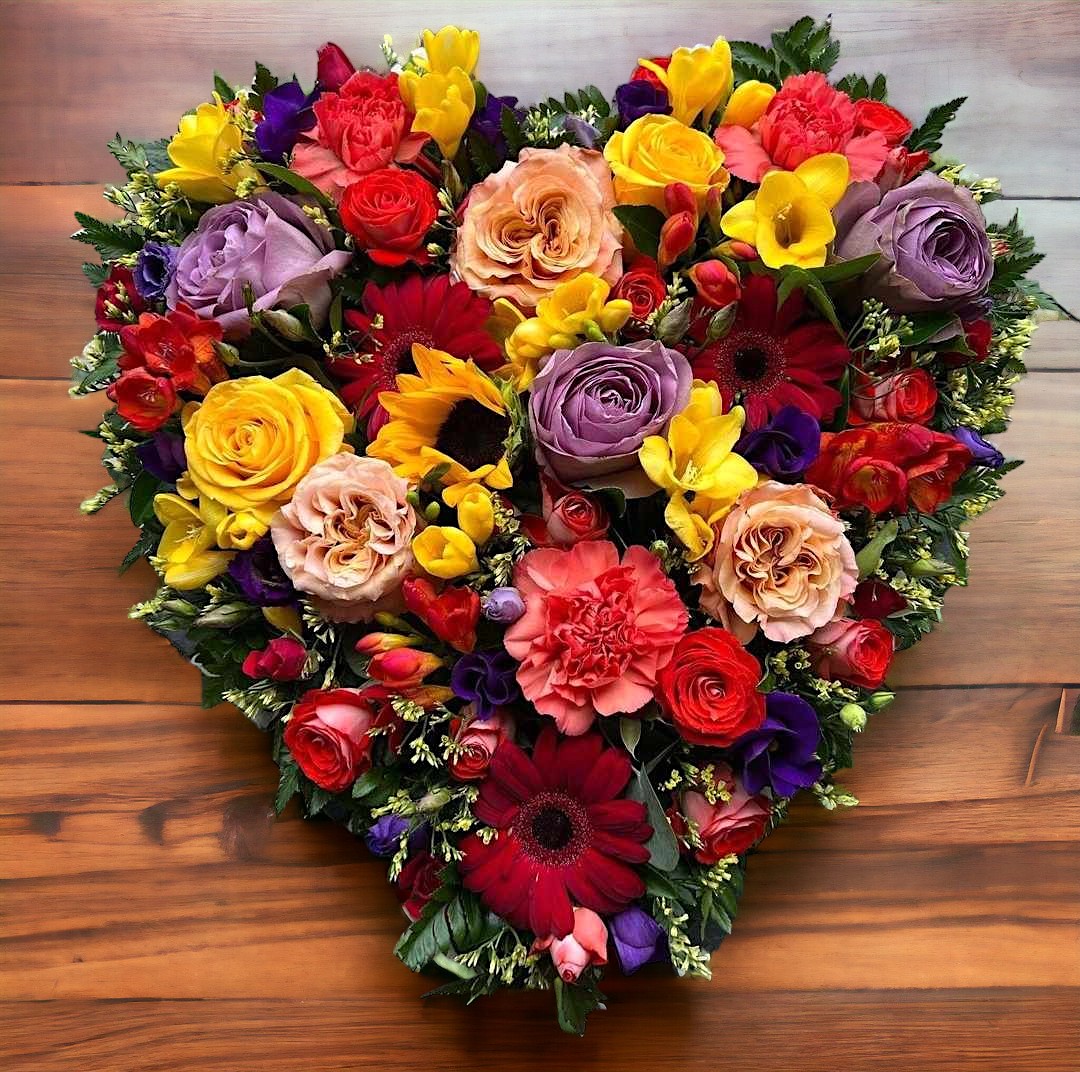 colourful funeral heart tribute