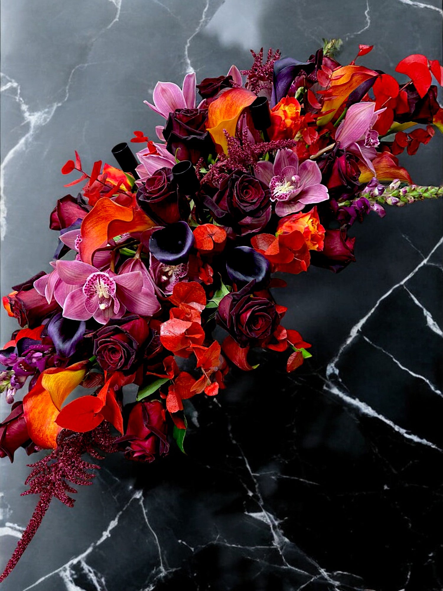 Modern Candelabra handcrafted floral centrepiece by Lotty's Flowers