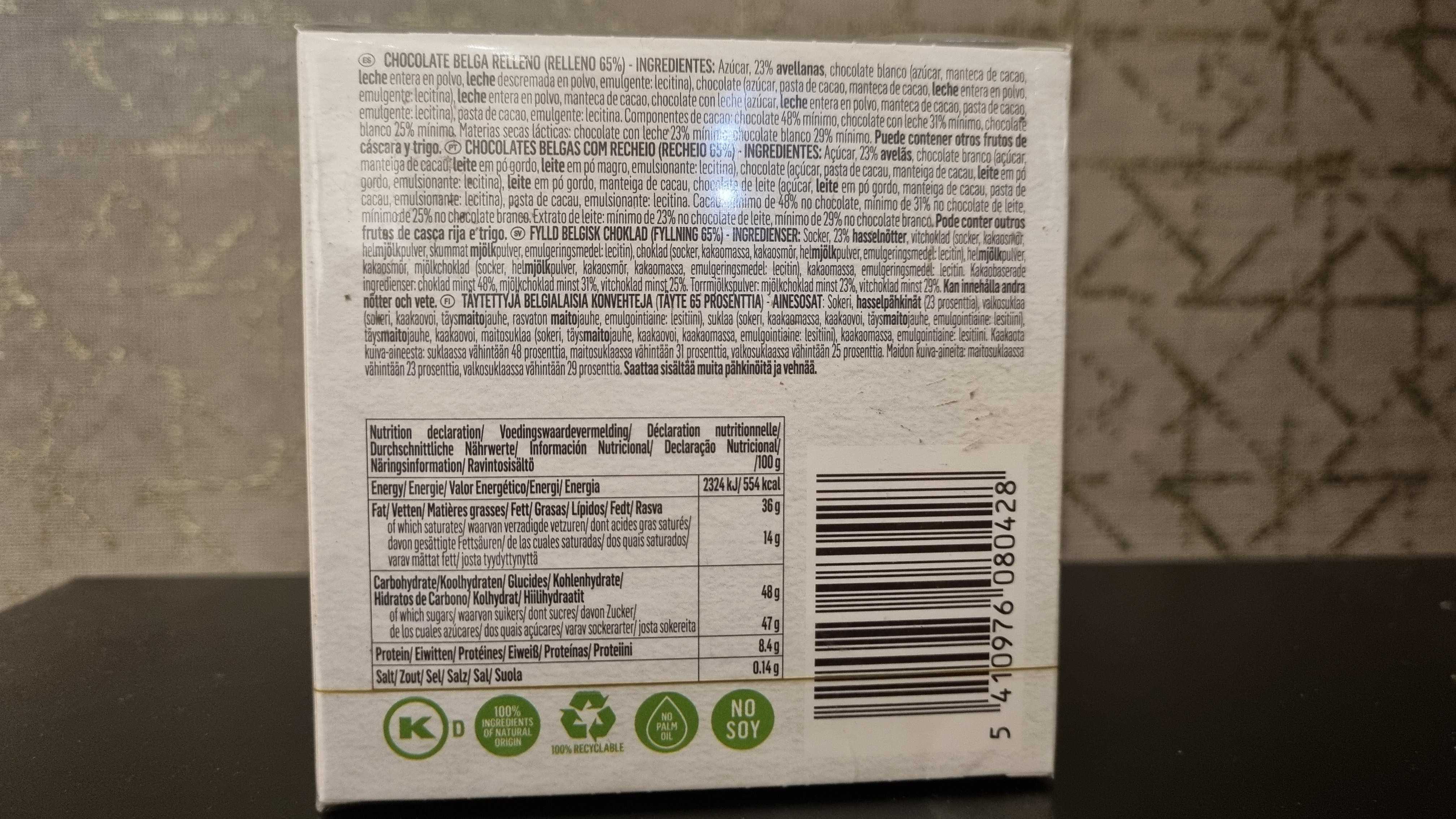 Back of a product packaging with text and barcodes on a textured surface