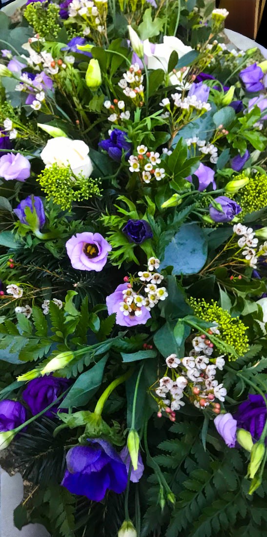 lilac and purple funeral tribute