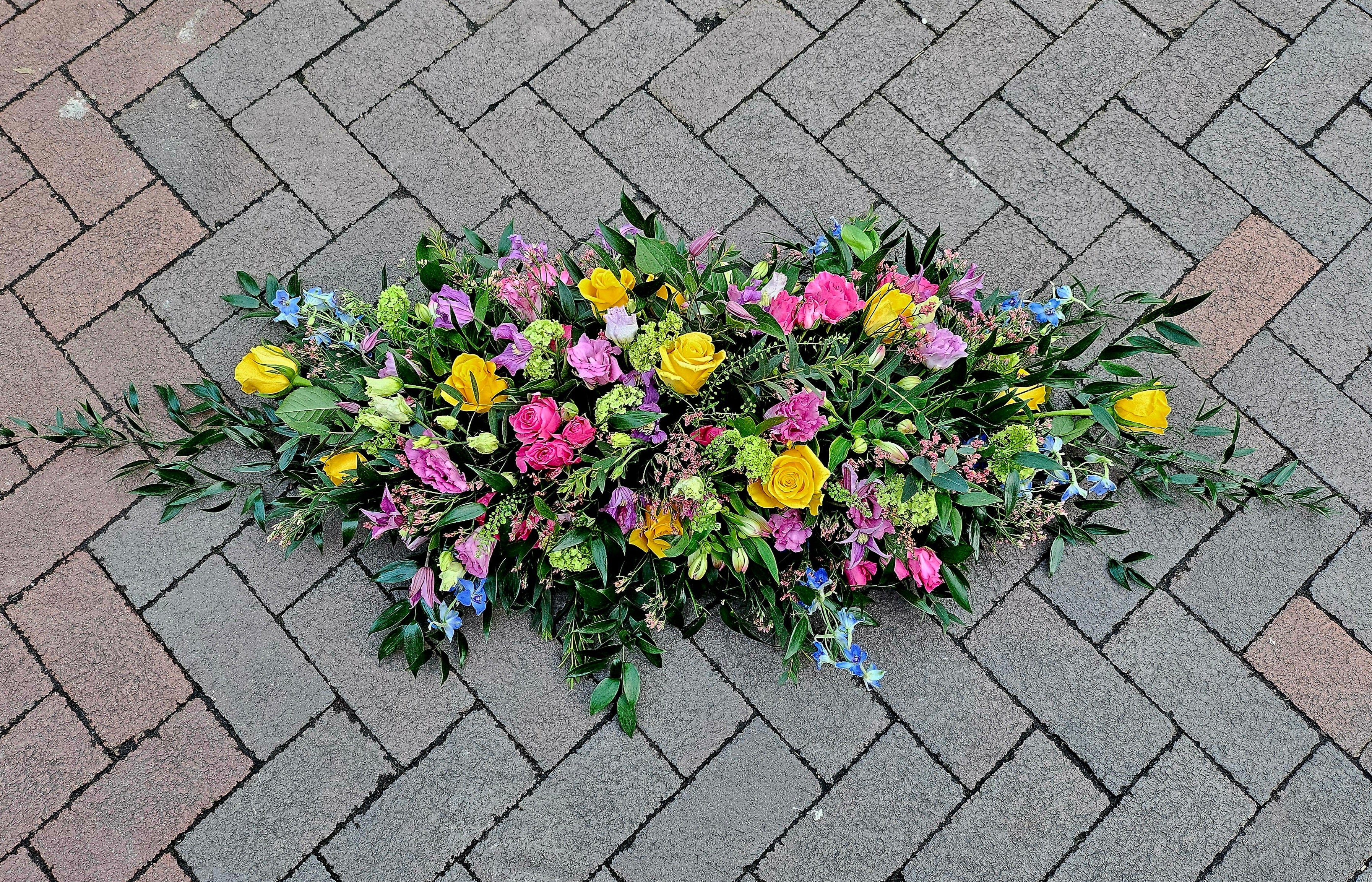 Colourful casket top