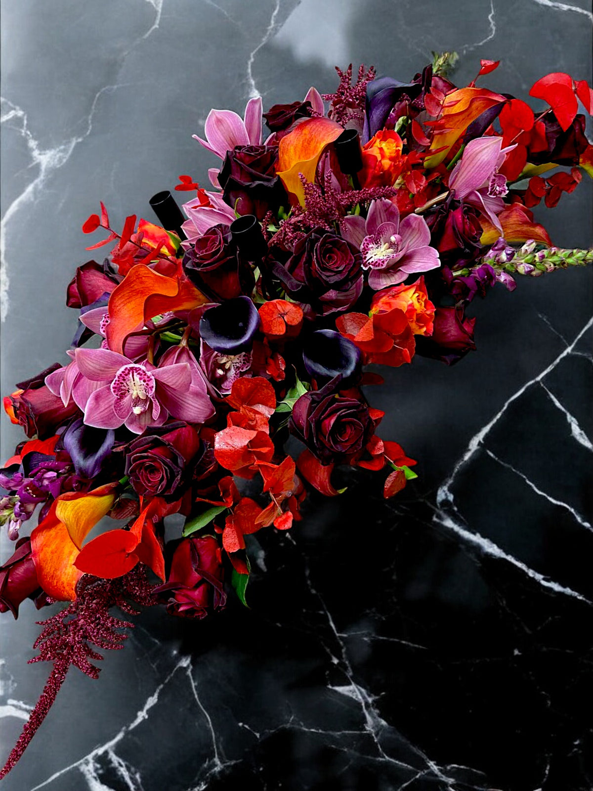 Modern Candelabra handcrafted floral centrepiece by Lotty's Flowers