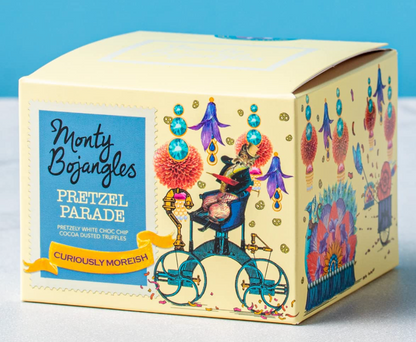 Monty Bojangles Pretzel Parade cocoa-dusted chocolate truffles in a cream illustrated box with a blue label