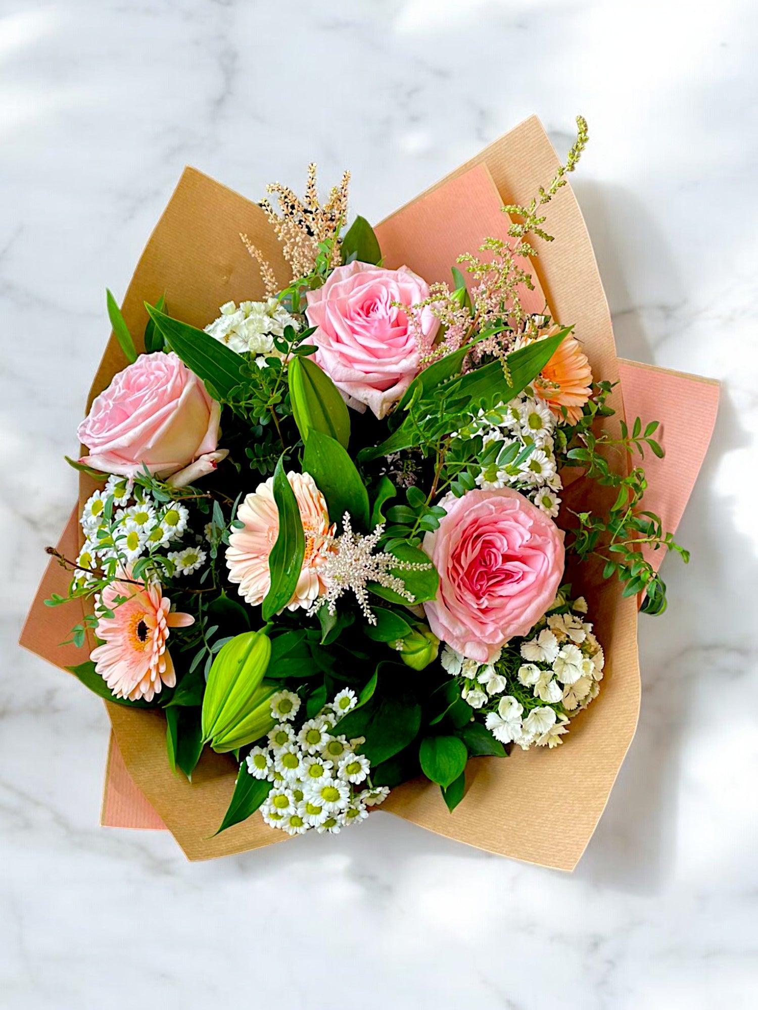 Pink, green and white bouquet from the top