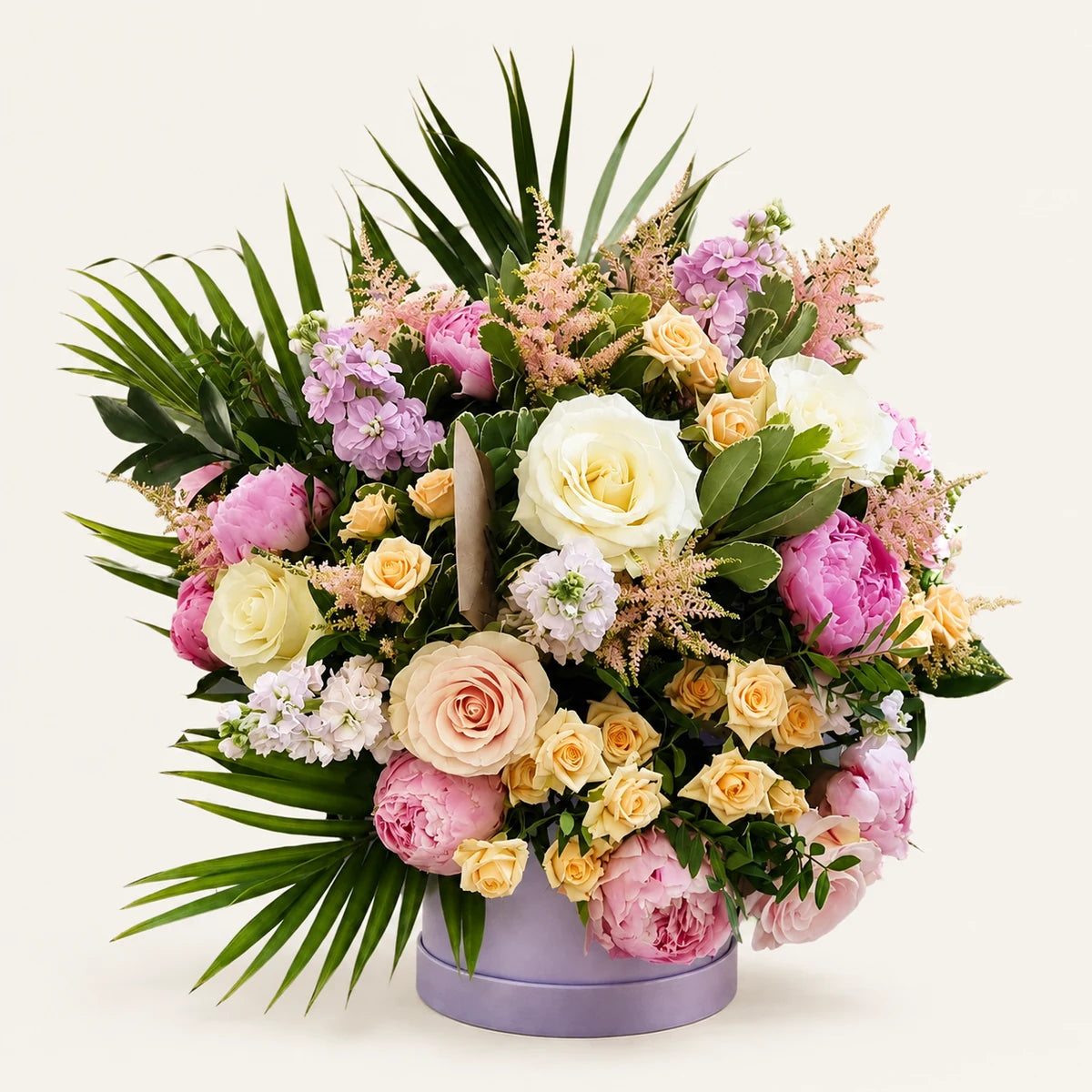 The Showstopper bouquet, side view, photographed on a soft cream background