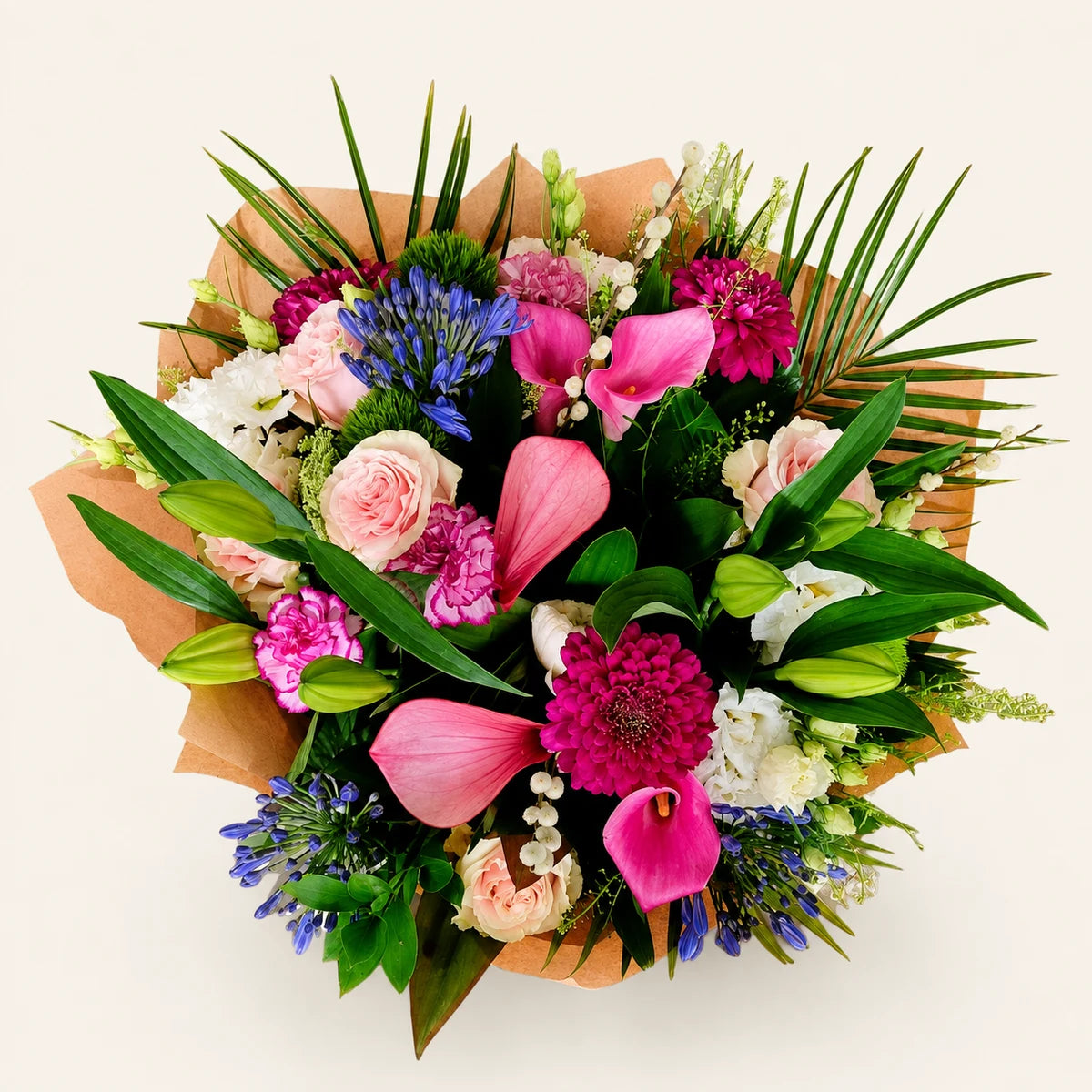The Showstopper bouquet, alternate angle, photographed on a soft cream background