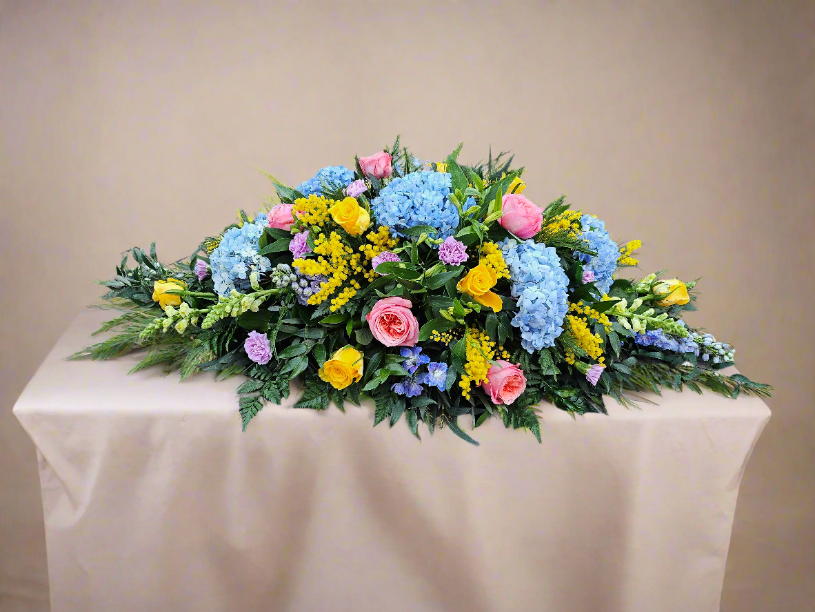 funeral flowers on table