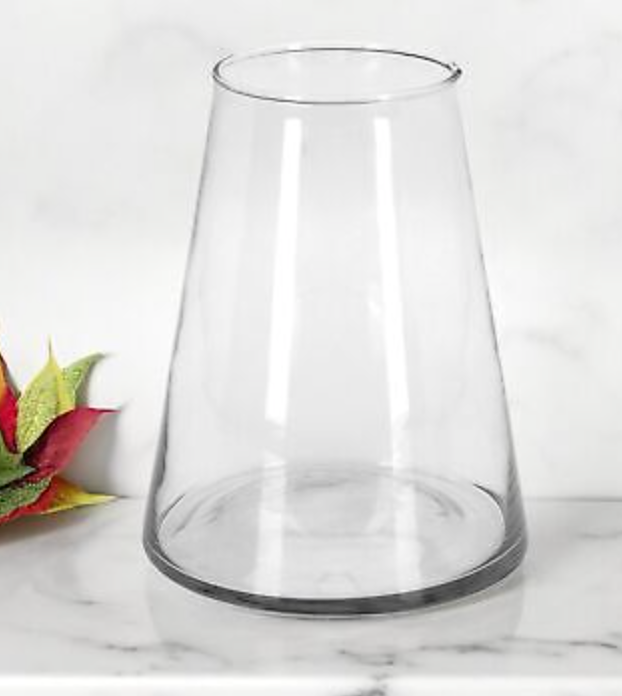 Clear tapered glass vase with a wide base for displaying a flower bouquet