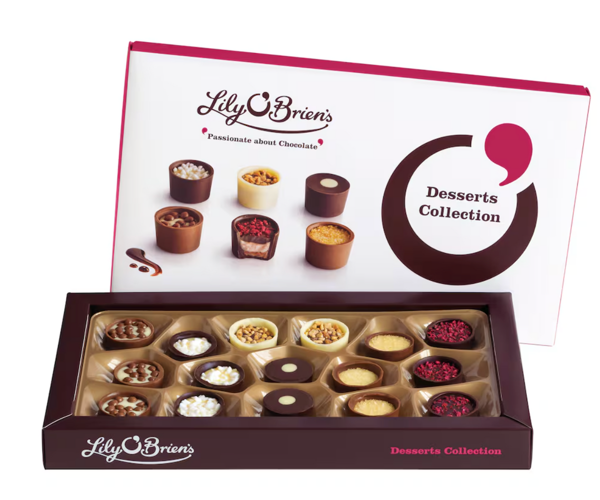 Open Lily O’Brien’s Desserts Collection chocolate box showing assorted dessert-inspired chocolates beside the lid