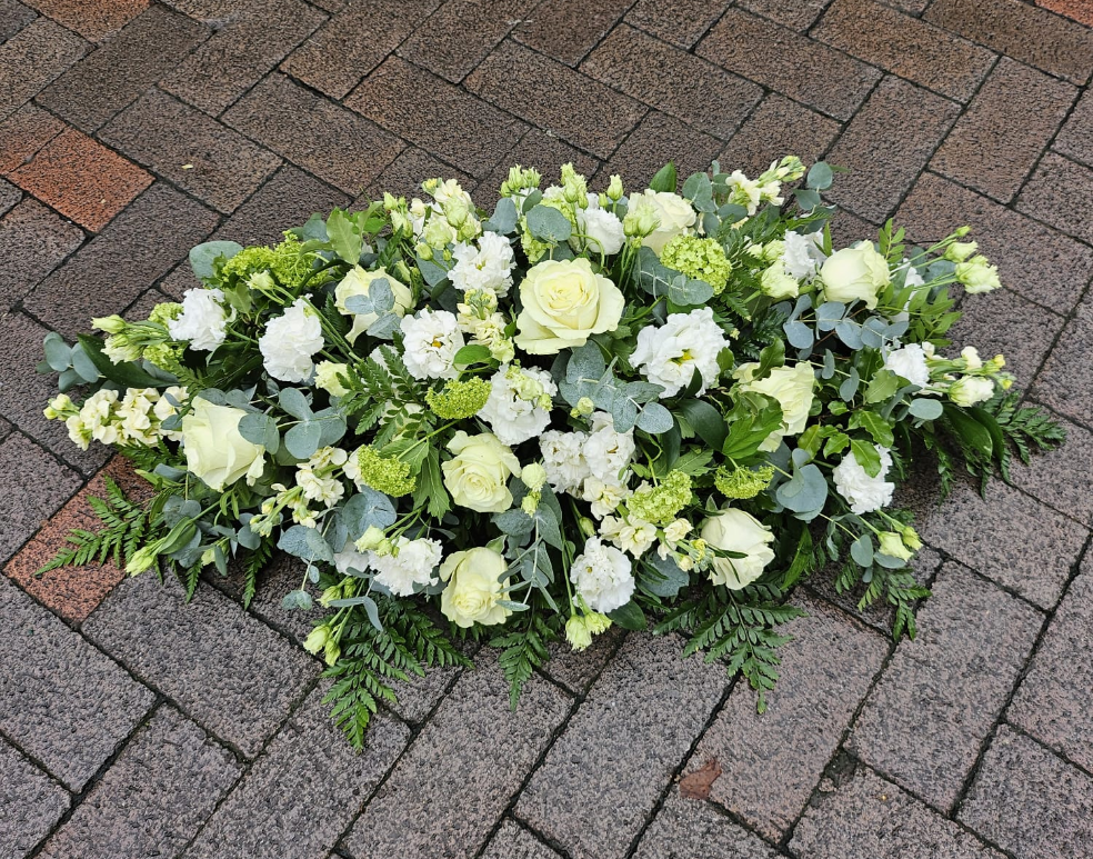 white roses funeral flowers